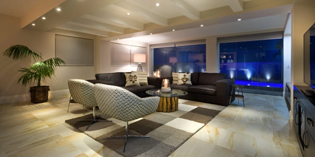 Residential interior design in Delhi – modern living room with luxury décor and warm lighting