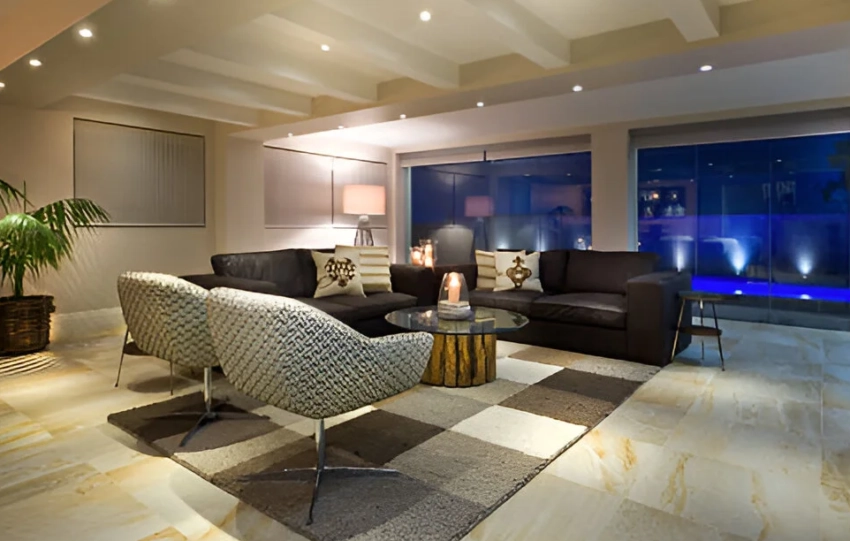 Residential interior design in Delhi – modern living room with luxury décor and warm lighting